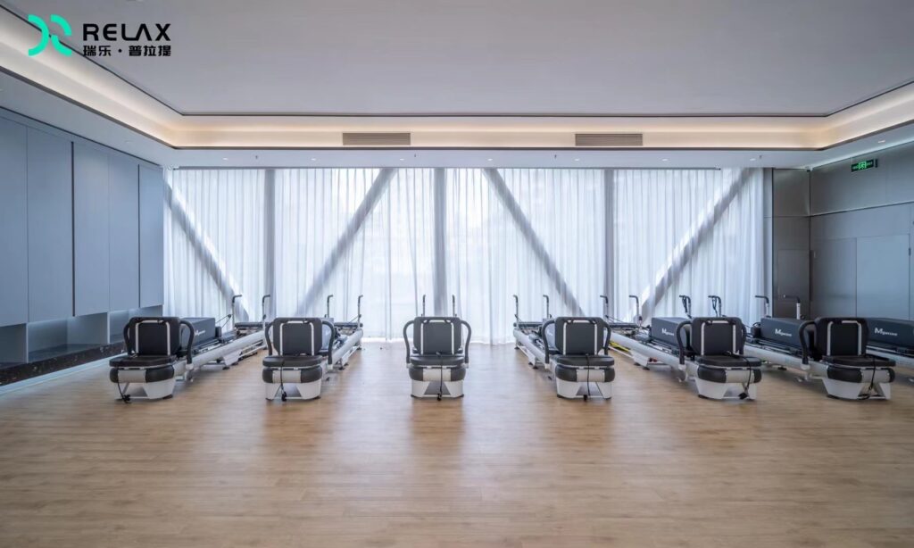 Guangzhou showroom pilates reformer — test before you buy and source from the factory 2 Pilates equipment investment for studio owners