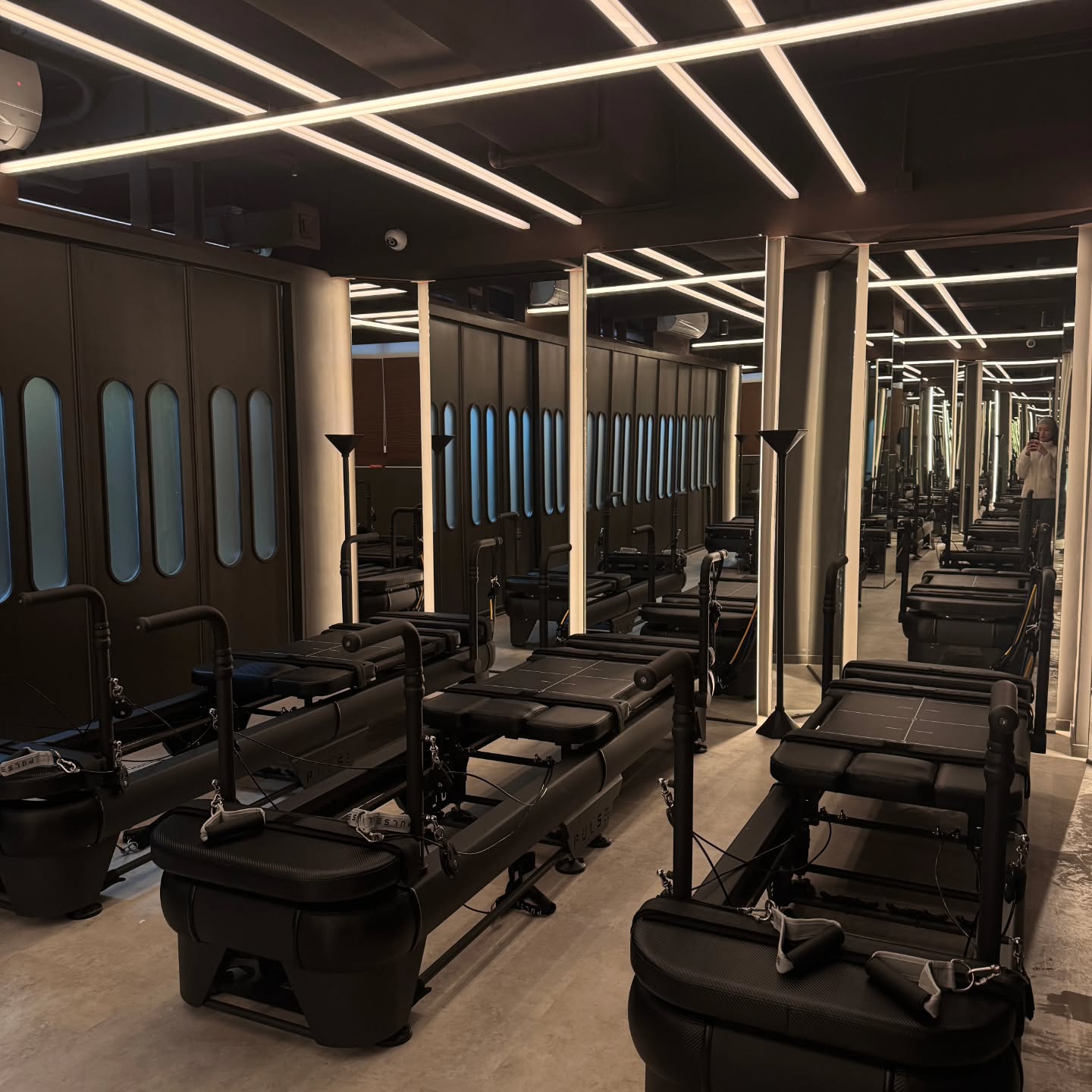 Guangzhou showroom with commercial pilates reformers on display for testing