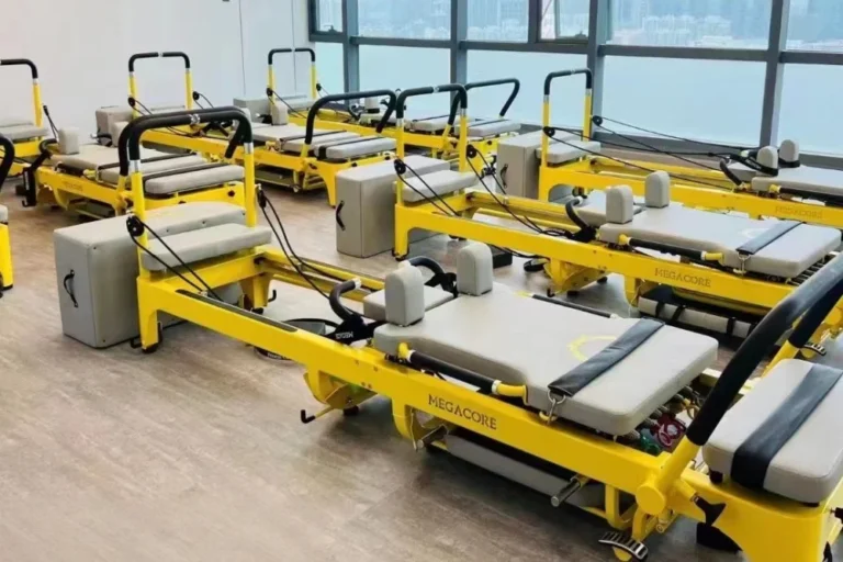 Complete range of pilates apparatus including reformers and cadillac equipment, designed for professional studio training environments