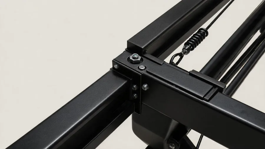 Pilates reformer frame materials: steel vs aluminum vs wood durability comparison 1 Detail of a reformer aluminum frame rail with anodized finish