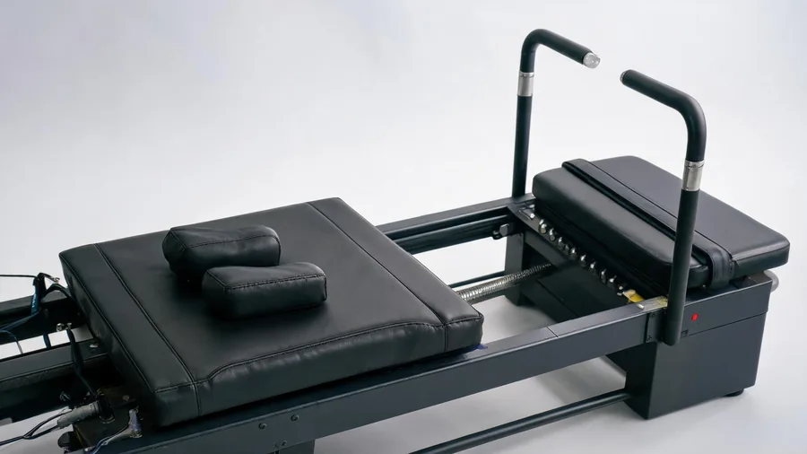 Pilates reformer headrest adjustment: complete guide for every body type 1 Close-up of k30 reformer adjustable headrest positions on the carriage