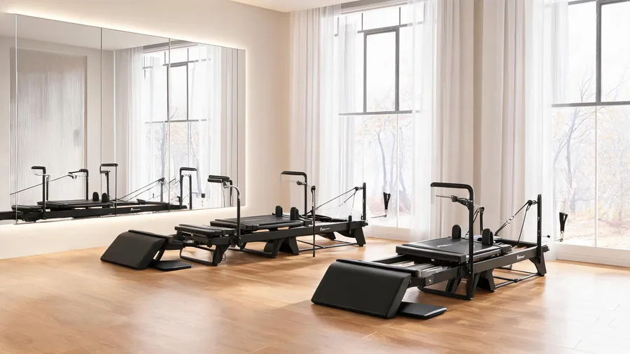 Pilates reformer jump board guide cover with C26 reformer and jump board in a bright studio