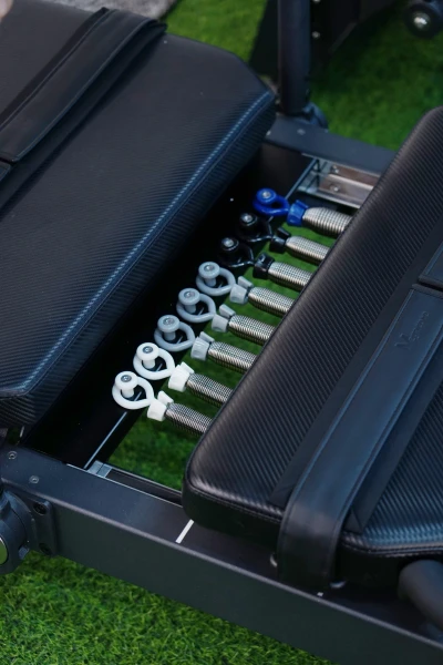 Pilates reformer spring tension calibration — each spring individually tested before assembly